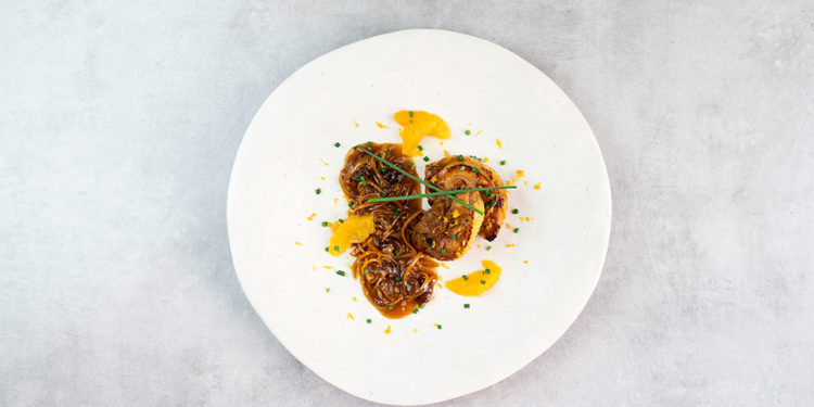 Delicias de pollo marinadas con salsa de naranja