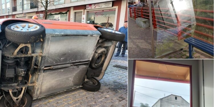 Los vándalos se ceban en Gondomar: un coche volcado y a patadas con una marquesina