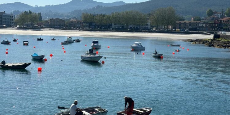 muellle de Canido, dos pescadores