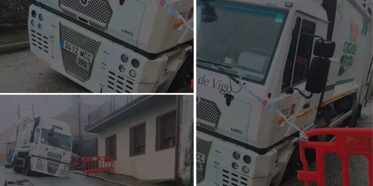 Un camión de la basura atrapado en un socavón mantiene en vilo a los vecinos de Rúa Casal